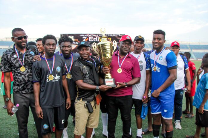 Eguma with the Tico Select preseason Eguma with the Tico Select trophy